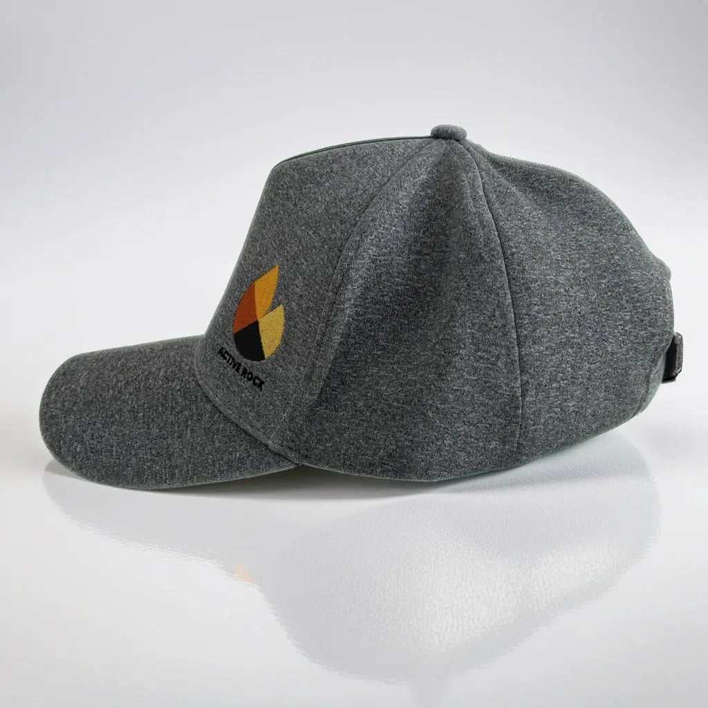 Grey Active Rock Cap with adjustable strap and logo.